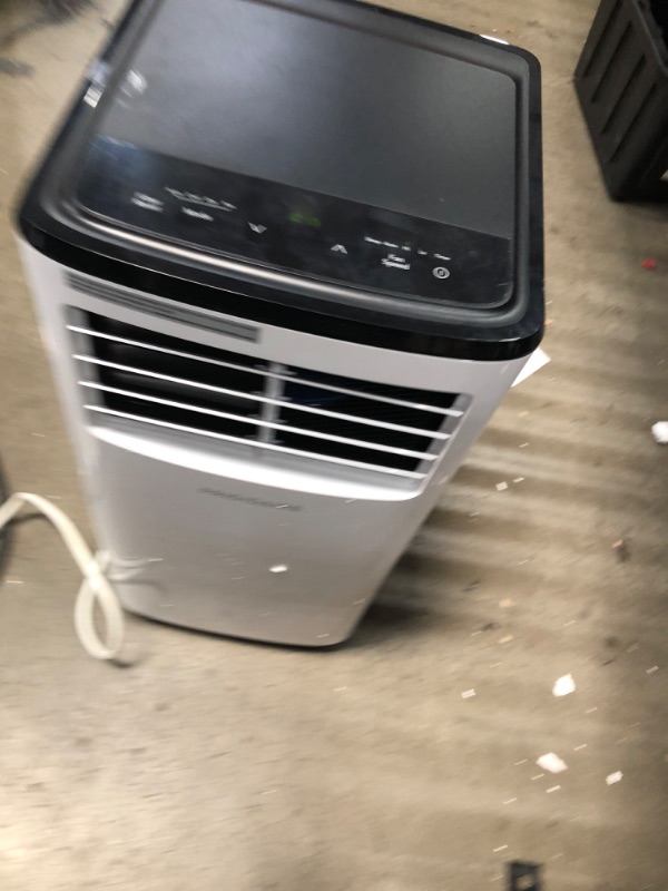 Photo 1 of PARTS ONLY COMPRESSOR DOES NOT SEEM TO COME ON 
Frigidaire 8,000 BTU Portable Air Conditioner in White