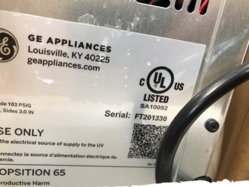 Photo 1 of GE Profile Opal | Countertop Nugget Ice Maker with Side Tank | Portable Ice Machine Makes up to 24 Lbs. of Ice per Day | Stainless Steel Finish

