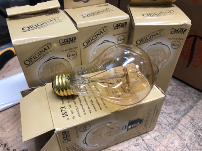 Photo 2 of *4 BULBS*
Feit Electric
60-Watt A19 Edison Dimmable Incandescent Amber Glass Vintage Light Bulb with Cage Filament Soft White