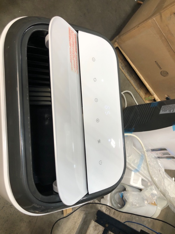 Photo 1 of BLACK+DECKER 14,000 BTU Portable Air Conditioner with Remote Control, White
