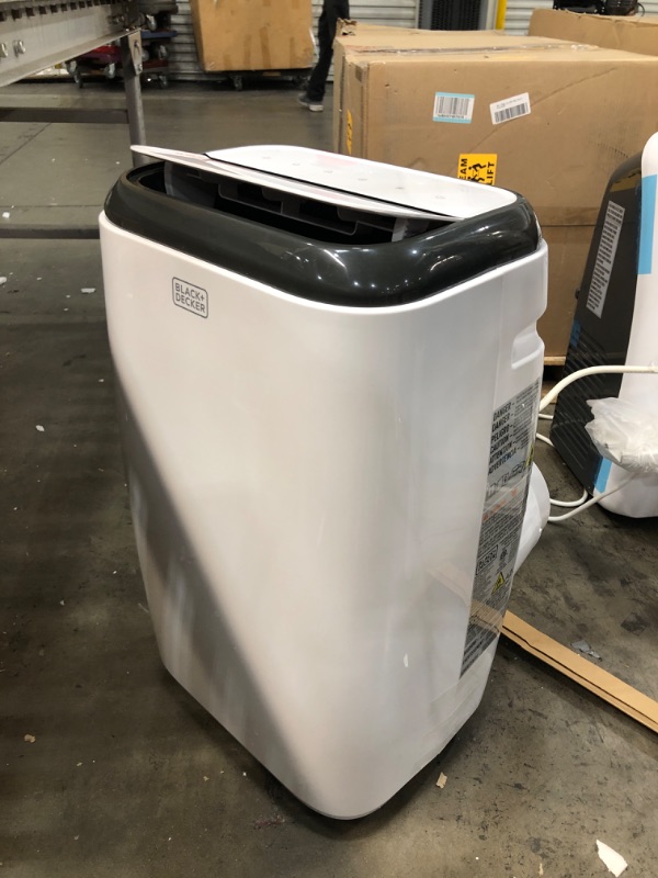 Photo 1 of BLACK+DECKER 14,000 BTU Portable Air Conditioner with Remote Control, White
