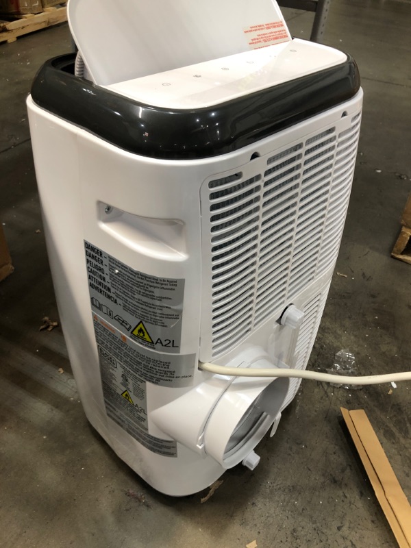 Photo 1 of BLACK+DECKER 14,000 BTU Portable Air Conditioner with Remote Control, White
