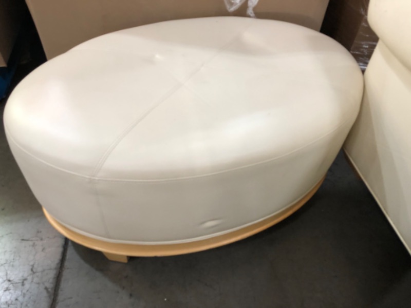 Photo 1 of 36" oval leather ottoman 