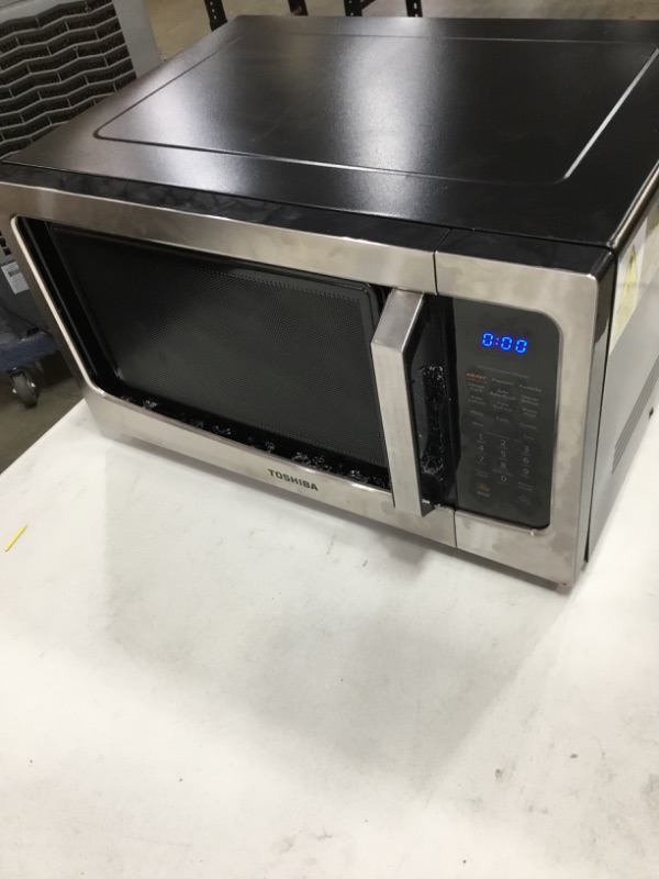 Photo 2 of **DAMAGED**TOSHIBA 4-in-1 ML-EC42P(SS) Microwave Oven, Smart Sensor, Convection, Air Fryer Combo, Easy-to-Clean Interior And ECO Mode, Mute Function, Position Memory Turntable, 1000W, 1.5 Cu Ft, Silver
