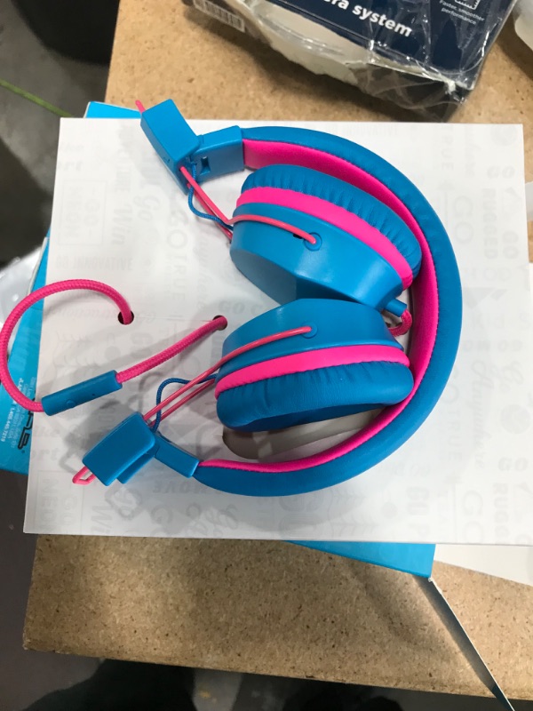 Photo 2 of JLab JBuddies Studio Over-Ear Kids Wired Headphones | Toddler Headphones | Kid Safe | Studio Volume Safe | Volume Limiter | Folding | Adjustable | Noise Isolation | with Mic (Cotton Candy)
