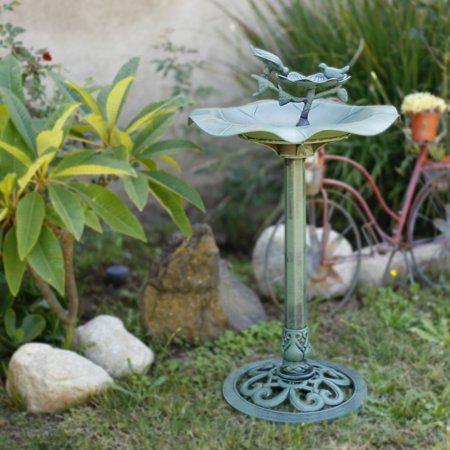 Photo 1 of Alpine Corporation Plastic Bird Bath Feeder for Yard and Garden Green. missing the stand and the decorative piece at the top.

