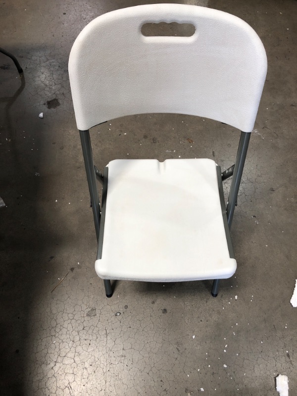 Photo 3 of **LIGHT DAMAGE** SKONYON 2-Pack Vinyl Folding Chairs White
