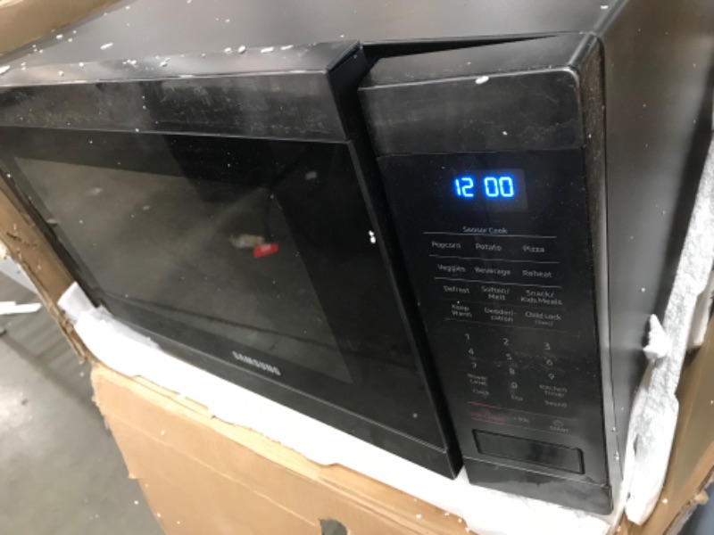 Photo 4 of **DAMAGED** Samsung MS19M8020TG/AA Microwave Oven, 1.9 cubic feet, Fingerprint Resistant Black Stainless Steel
