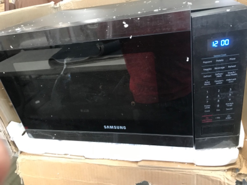 Photo 6 of **DAMAGED** Samsung MS19M8020TG/AA Microwave Oven, 1.9 cubic feet, Fingerprint Resistant Black Stainless Steel
