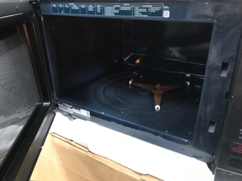 Photo 3 of **DAMAGED** Samsung MS19M8020TG/AA Microwave Oven, 1.9 cubic feet, Fingerprint Resistant Black Stainless Steel
