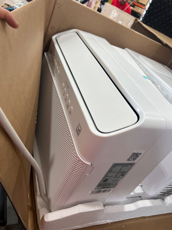 Photo 1 of Midea 12,000 BTU U-Shaped Smart Inverter Window Air Conditioner–Cools up to 550 Sq. Ft., Ultra Quiet with Open Window Flexibility, Works with Alexa/Google Assistant, 35% Energy Savings, Remote Control