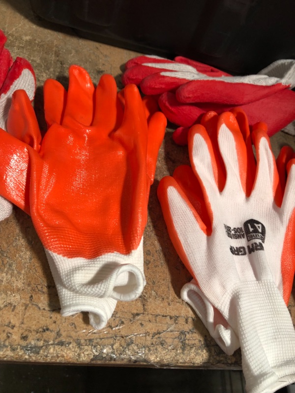 Photo 2 of Bundle of 7
Rubber Grip work Gloves Orange and Red Large 