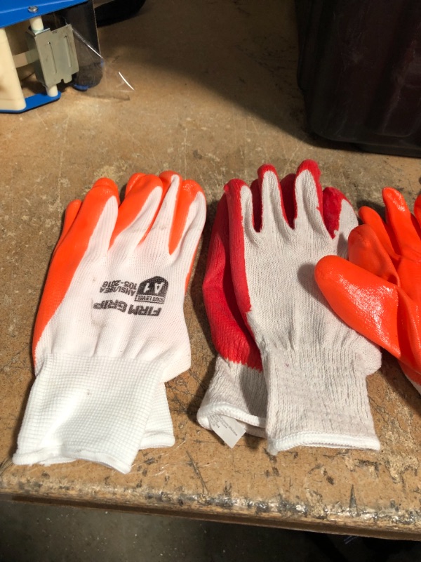 Photo 3 of Bundle of 7
Rubber Grip work Gloves Orange and Red Large 