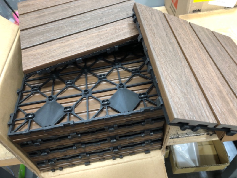 Photo 2 of *10 TILES *
NewTechWood
UltraShield Naturale 1 ft. x 1 ft. Quick Deck Outdoor Composite Deck Tile in Spanish Walnut (10 sq. ft. per Box)