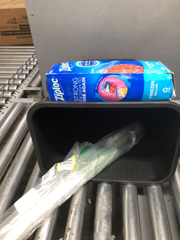 Photo 1 of 13 gallon trash can/freezer bags/curtain rod