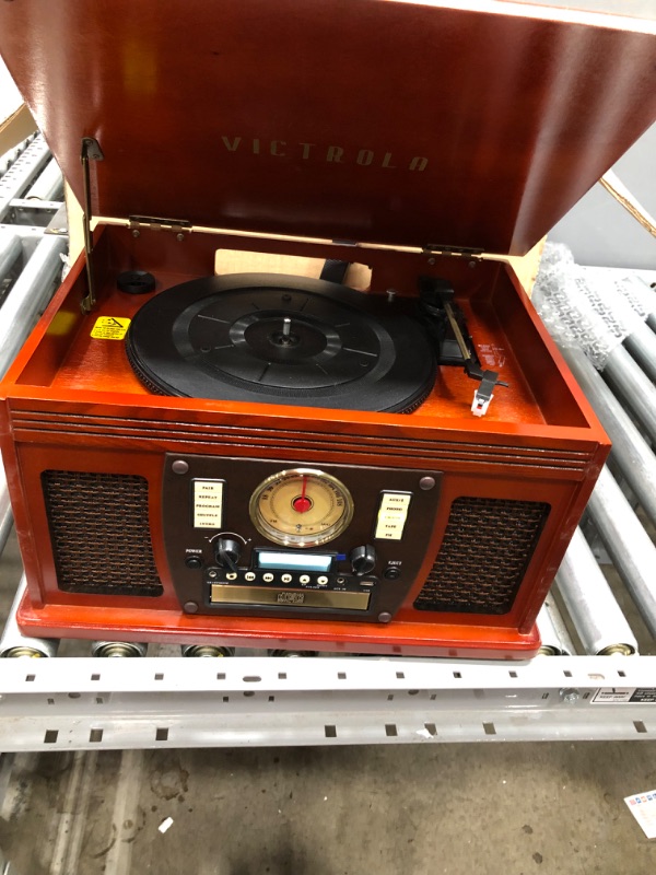 Photo 3 of INCOMPLETE ITEM
Victrola 8-in-1 Bluetooth Record Player & Multimedia Center, Built-in Stereo Speakers - Turntable, Wireless Music Streaming, Real Wood | Mahogany
