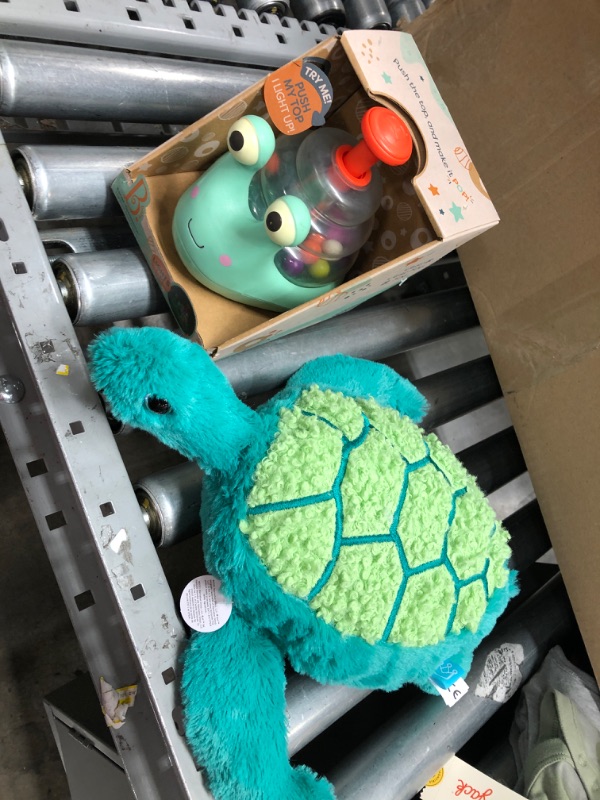 Photo 2 of B. toys Light-up Snail Ball Popper - Escar-Gloooooow

with sea turtle plush