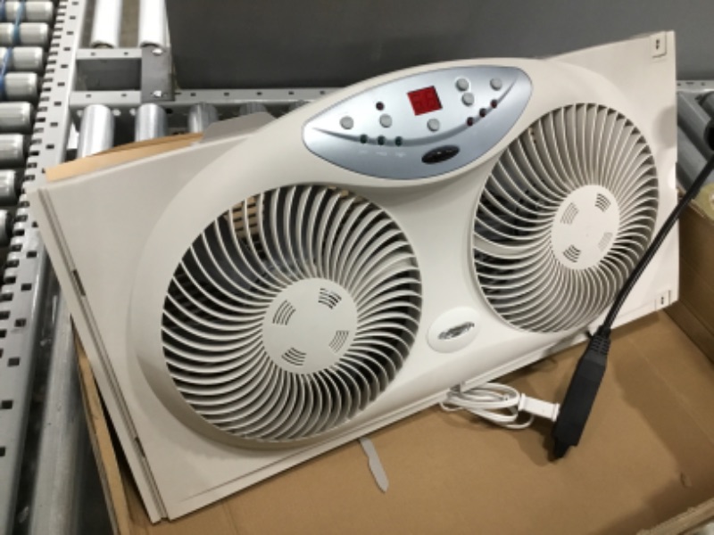 Photo 2 of ****NON-FUNCTIONAL/PARTS ONLY***
Bionaire Window Fan with Twin 8.5-Inch Reversible Airflow Blades and Remote Control, White
