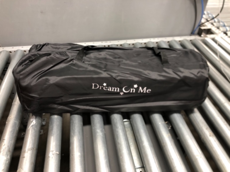 Photo 2 of Dream On Me Zodiak Portable Playard with Carry Bag & Shoulder Strap, Black
