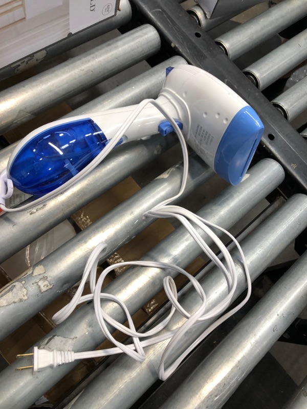 Photo 4 of **not functional**
Conair ExtremeSteam Hand Held Fabric Steamer with Dual Heat White/Blue Model GS237X
