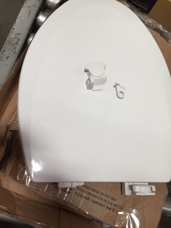 Photo 2 of **DAMAGED** Bemis Elongated Enameled Wood Toilet Seat in Cotton White with Easy•Clean
