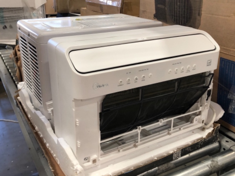 Photo 2 of USED: Midea 8,000 BTU U-Shaped Smart Inverter Window Air Conditioner–Cools up to 350 Sq. Ft., Ultra Quiet with Open Window Flexibility, Works with Alexa/Google Assistant, 35% Energy Savings, Remote Control 19.17 x 21.97 x 13.46 inches

