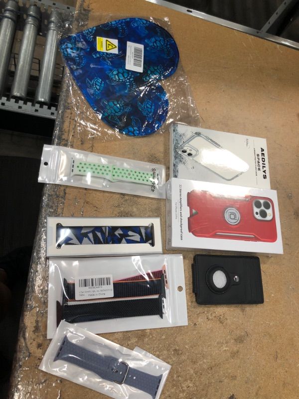 Photo 1 of ** ELETRONIC BUNDLE***
IPHONE CASES
APPLE WATCH BANDS 
AIRTAG WALLET CLIP
HEART SHAPED COMPUTER MOUSE PAD 