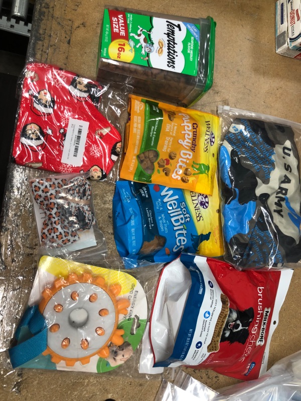 Photo 1 of *** PET BUNDLE***
DOG RAIN COAT XL 
CAT TREATS *** BB 12/21/22***
DOG CHRISTMAS OUTFIT
DOG BOW TIE
DOG CHEWY TOY
WELLNESS DOG AND PUPPY TREATS ***BB 7/15/22 AND 7/25/22***
DOG MILK BONES **BB 4/26/22***