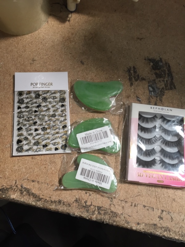 Photo 1 of Selfcare Bundle
Face Scraper, Finger Nail Stickers, Eye Lashes 