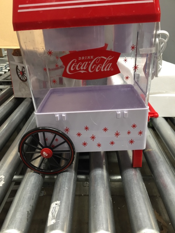 Photo 2 of **PARTS ONLY**
Nostalgia SCM550COKE Coca-Cola Countertop Snow Cone Maker Makes 20 Icy Treats, Includes 2 Reusable Plastic Cups & Ice Scoop – White/Red