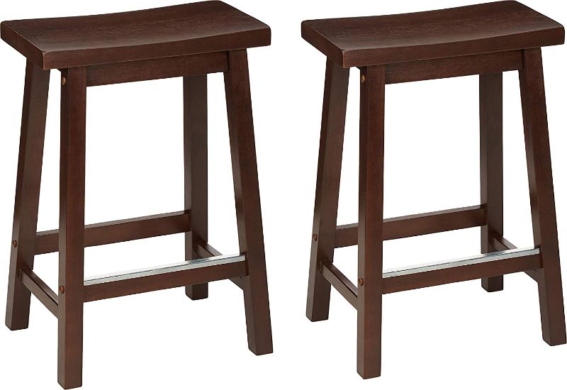 Photo 1 of Amazon Basics Solid Wood Saddle-Seat Kitchen Counter-Height Stool - Set of 2, 24" Counter Stool, Walnut Finish
