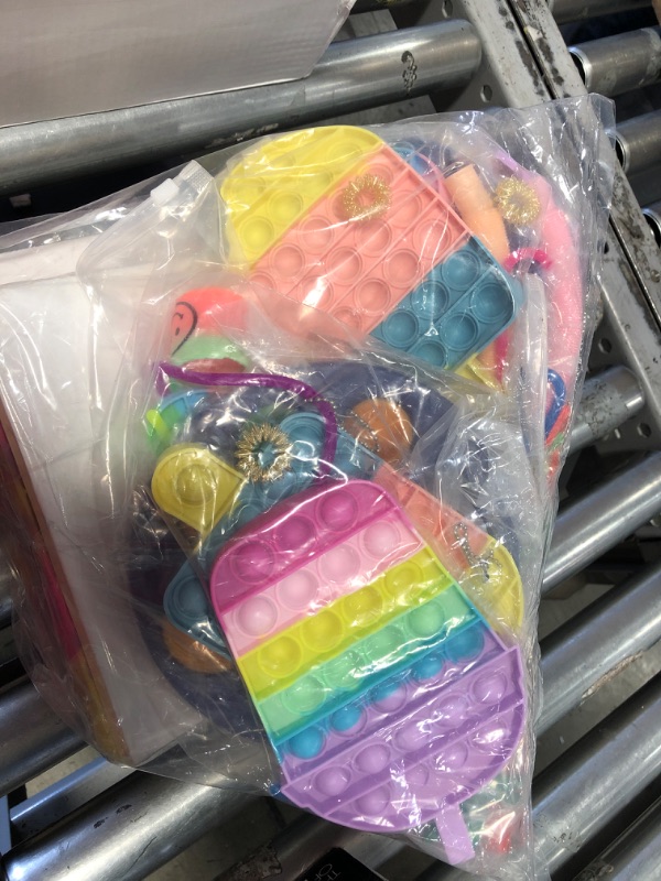 Photo 1 of BUNDLE OF ASSORTED POP IT FIDGET TOYS 