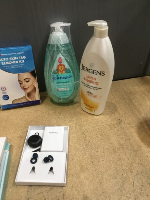 Photo 1 of ***NON-REFUNDABLE***
HEALTH AND BEAUTY 
2 BOXES OF EYELASHES, 2 BOXES OF BENZODENT, 22'' INCH HAIR EXTENTION,EAR PLUGS, LYSOL, CLICK GEL CLEANER,  SKIN TAG REMOVAL KIT, JOHNSON'S 2-IN-1 SHAMPOO, JERGEN'S LOTION
