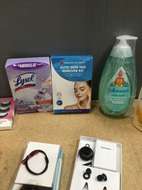 Photo 5 of ***NON-REFUNDABLE***
HEALTH AND BEAUTY 
2 BOXES OF EYELASHES, 2 BOXES OF BENZODENT, 22'' INCH HAIR EXTENTION,EAR PLUGS, LYSOL, CLICK GEL CLEANER,  SKIN TAG REMOVAL KIT, JOHNSON'S 2-IN-1 SHAMPOO, JERGEN'S LOTION