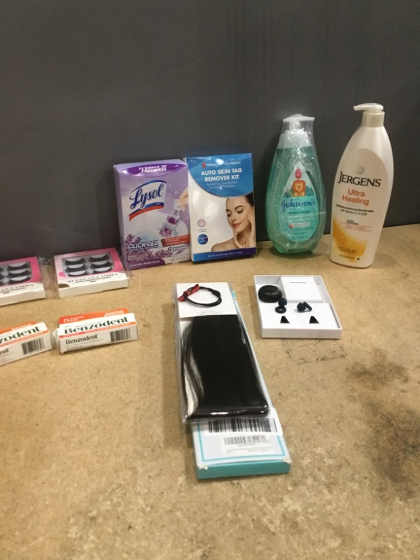 Photo 6 of ***NON-REFUNDABLE***
HEALTH AND BEAUTY 
2 BOXES OF EYELASHES, 2 BOXES OF BENZODENT, 22'' INCH HAIR EXTENTION,EAR PLUGS, LYSOL, CLICK GEL CLEANER,  SKIN TAG REMOVAL KIT, JOHNSON'S 2-IN-1 SHAMPOO, JERGEN'S LOTION