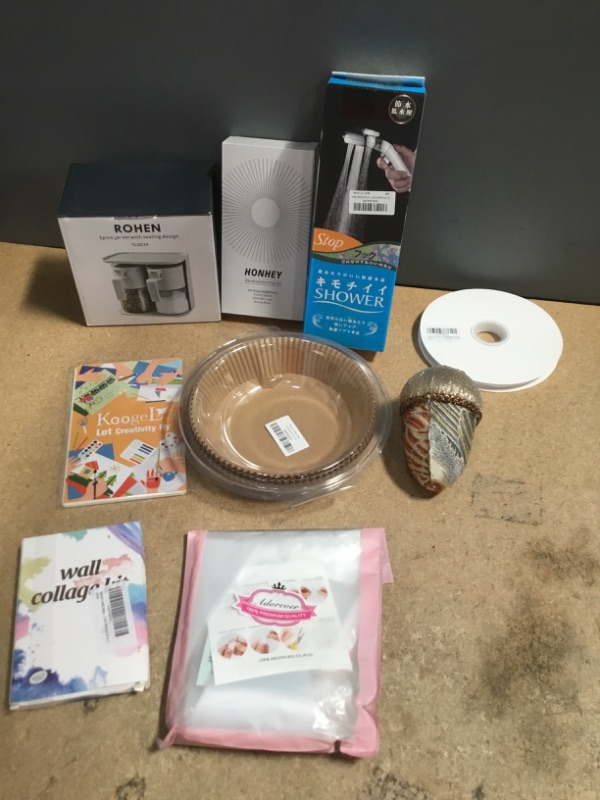 Photo 7 of ***non-refundable***
house hold goods, 9 items
spice jar set, handheld mini fan, shower head, roll of white ribbon ,acorn decoration, disposable air fryer liners, wall collage kit, pastry piping bags, stenclis
