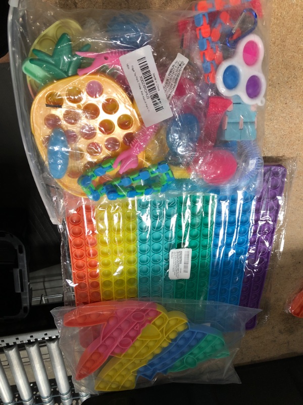 Photo 1 of BUNDLE OF FIDGET TOYS NON-REFUNDABLE.