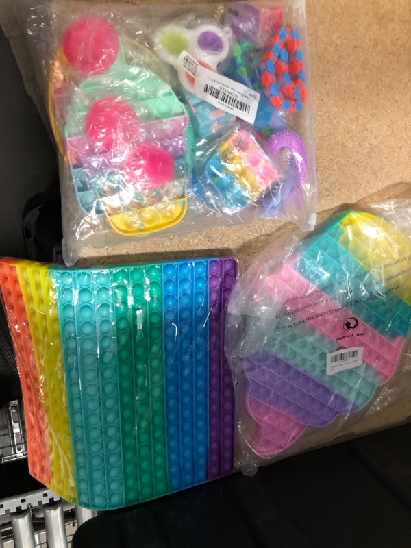 Photo 1 of BUNDLE OF FIDGET TOYS NON-REFUNDABLE.