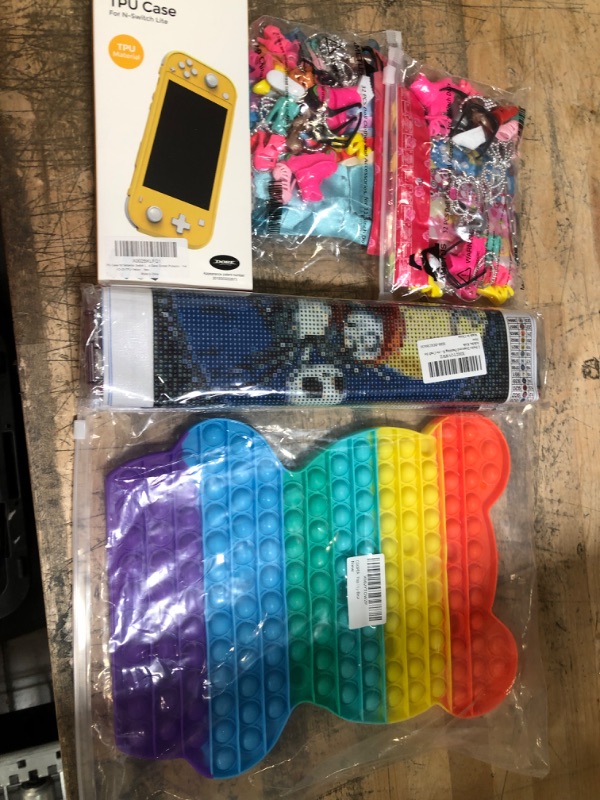 Photo 1 of ASSORTED BAG OF KIDS TOYS, NINTENDO SWITCH LITE CASE/DOLL ACCESSORIES/DIAMOND PAINTING KRAFT