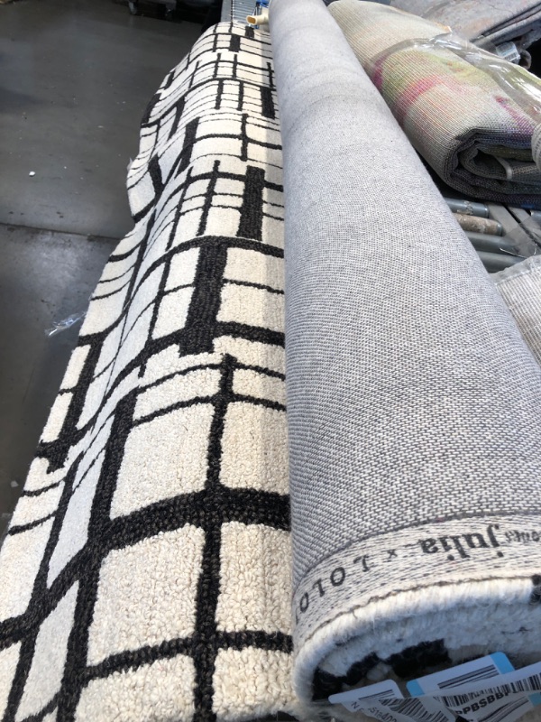 Photo 1 of 7'9" x 9'7" white and black fuzzy checkered  rug 