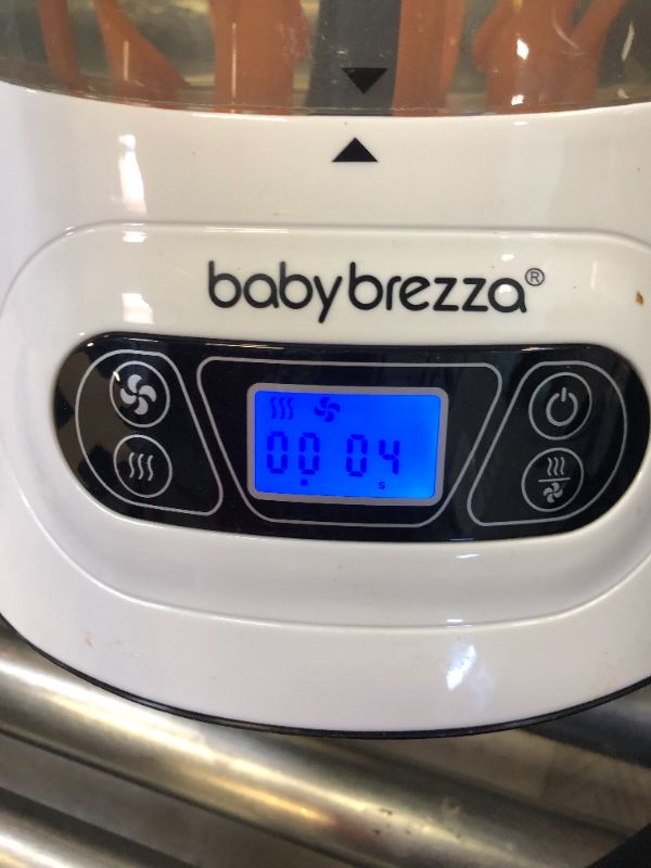Photo 3 of Baby Brezza Baby Bottle Sterilizer and Dryer Machine – Electric Steam Sterilization - Universal Fit - Pacifiers, Glass, Plastic, and Newborn Feeding Bottles
