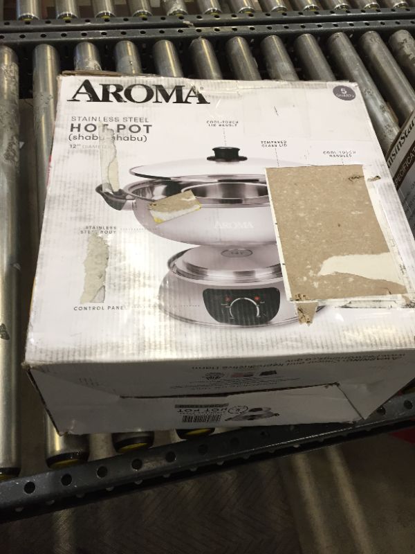 Photo 2 of Aroma Stainless Steel Hot Pot, Silver (ASP-600), 5 quart, HEAVILY USED, LIGHT TURNS ON BUT UNAWARE IF HEATS UP PROPERLY 
