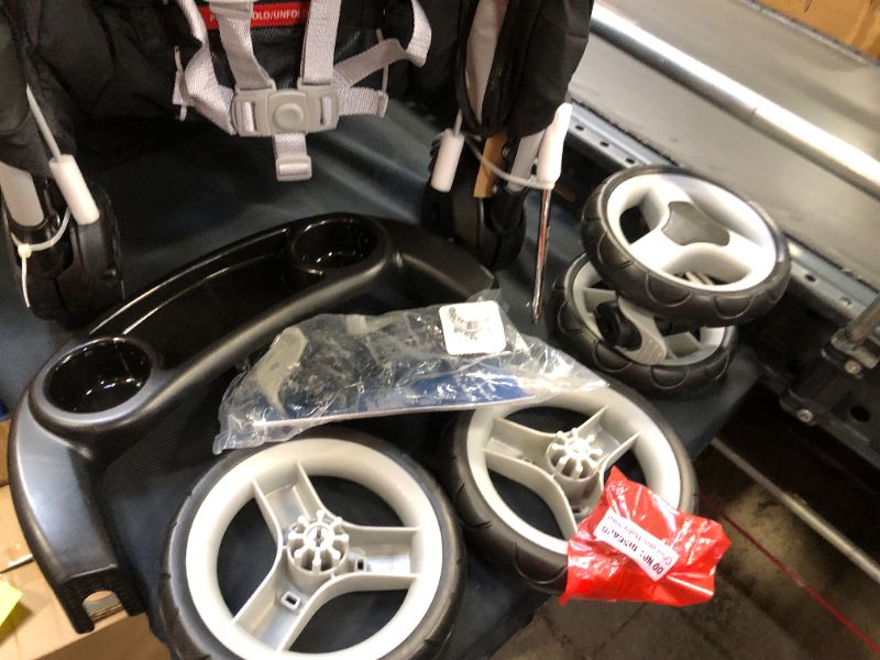 Photo 4 of Graco FastAction Fold Sport Click Connect Travel System with SnugRide Infant Car Seat - Gotham