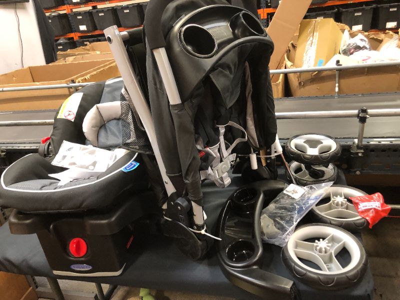 Photo 2 of Graco FastAction Fold Sport Click Connect Travel System with SnugRide Infant Car Seat - Gotham