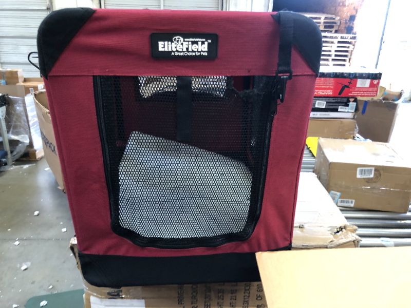 Photo 2 of EliteField 3-Door Folding Soft Dog Crate --- hole in entrance as shown.