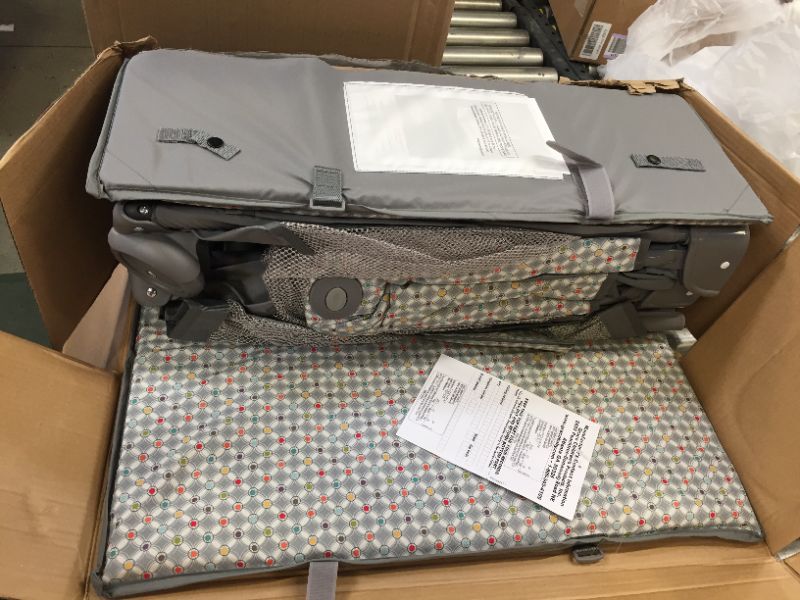 Photo 2 of Graco Pack 'n Play Playard On The Go, Pasadena --- major damage to carying case and under base as shown.