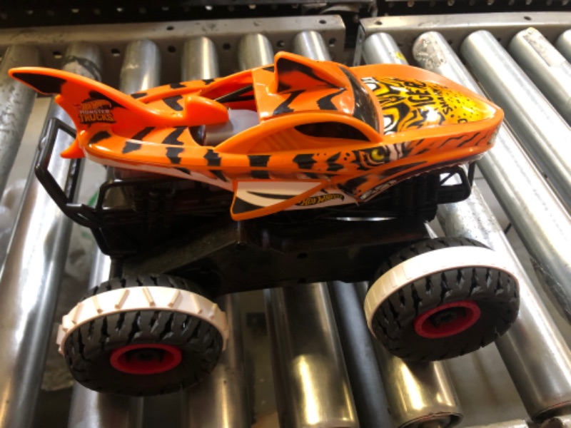 Photo 2 of Hot Wheels Monster Trucks, Remote Control Car, Monster Truck Toy with All-Terrain Wheels, 1:15 Scale Unstoppable Tiger Shark RC
