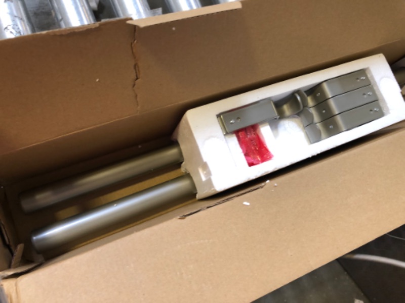 Photo 1 of 72"-144" curtain rods 