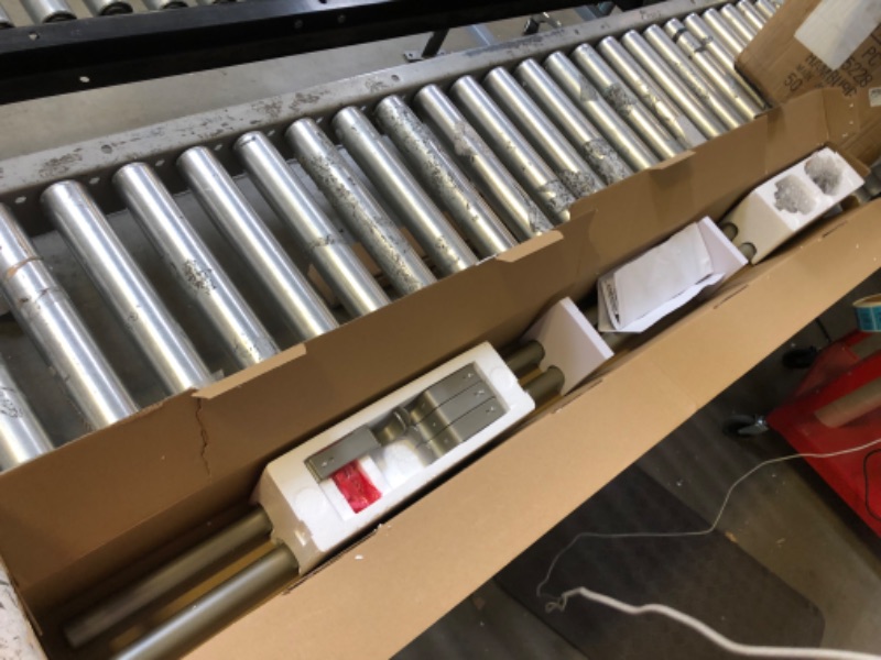 Photo 1 of 72"-144" curtain rods 