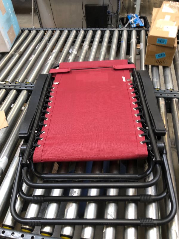 Photo 4 of Amazon Basics Outdoor Textilene Adjustable Zero Gravity Folding Reclining Lounge Chair with Pillow, Burgundy. Moderate Use, Damage to PLastic Knob. Box Packaging Damaged. Not in Original Box Packaging. 
